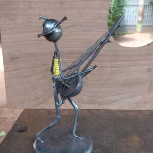 Petite Sculpture de décoration "Joueur de Cora"